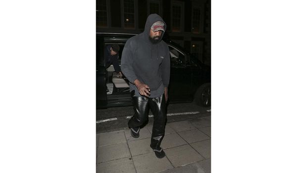LONDON, ENGLAND - SEPTEMBER 26:  Kanye West seen attending the Burberry Spring / Summer 2023 aftershow party at The Restaurant at The Twenty Two on September 26, 2022 in London, England. (Photo by Ricky Vigil M/GC Images)