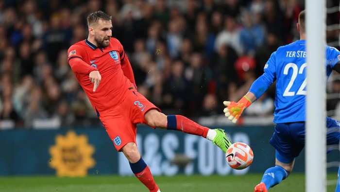 LONDON, ENGLAND - SEPTEMBER 26: Luke Shaw of England scores their teams first goal past Marc-Andre ter Stegen of Germany during the UEFA Nations League League A Group 3 match between England and Germany at Wembley Stadium on September 26, 2022 in London, England. (Photo by Justin Setterfield - The FA/The FA via Getty Images)
