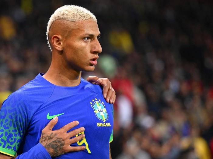 Brazil's forward Richarlison celebrates after scoring his team's second goal during the friendly football match between Brazil and Tunisia at the Parc des Princes in Paris on September 27, 2022. (Photo by Anne-Christine POUJOULAT / AFP) (Photo by ANNE-CHRISTINE POUJOULAT/AFP via Getty Images)
