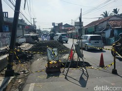 Anggota DPRD Minta Lubang Menganga di Jl Cibungbulang Bogor Diperbaiki!