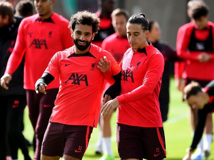 KIRKBY, ENGLAND - SEPTEMBER 29: (THE SUN OUT, THE SUN ON SUNDAY OUT) Mohamed Salah and Kostas Tsimikas of Liverpool during a training session at AXA Training Centre on September 29, 2022 in Kirkby, England. (Photo by Andrew Powell/Liverpool FC via Getty Images)