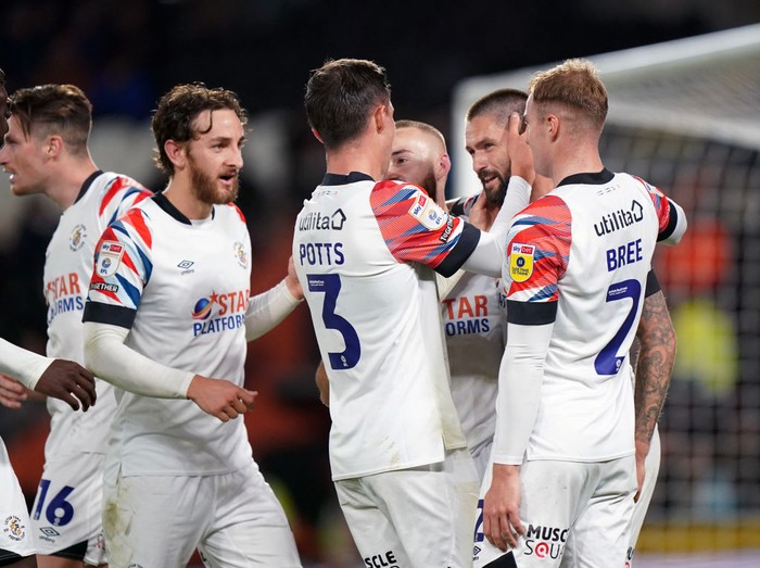 Henri Lansbury Luton Town's Henri Lansbury (second right) celebrates scoring their side's second goal of the game during the Sky Bet Championship match at MKM Stadium, Hull. Picture date: Friday September 30, 2022. (Photo by Tim Goode/PA Images via Getty Images)