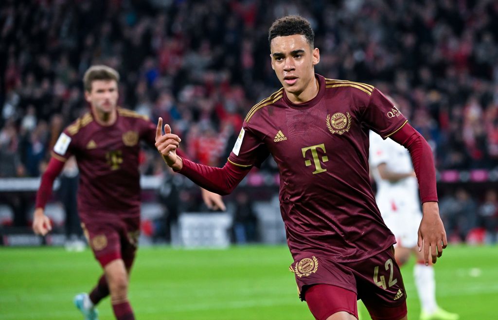 30 September 2022, Bavaria, Munich: Soccer: Bundesliga, Bayern Munich - Bayer Leverkusen, Matchday 8 at Allianz Arena. Jamal Musiala of Munich celebrates his goal to make it 2:0. Photo: Sven Hoppe/dpa - IMPORTANT NOTE: In accordance with the requirements of the DFL Deutsche Fußball Liga and the DFB Deutscher Fußball-Bund, it is prohibited to use or have used photographs taken in the stadium and/or of the match in the form of sequence pictures and/or video-like photo series. (Photo by Sven Hoppe/picture alliance via Getty Images)