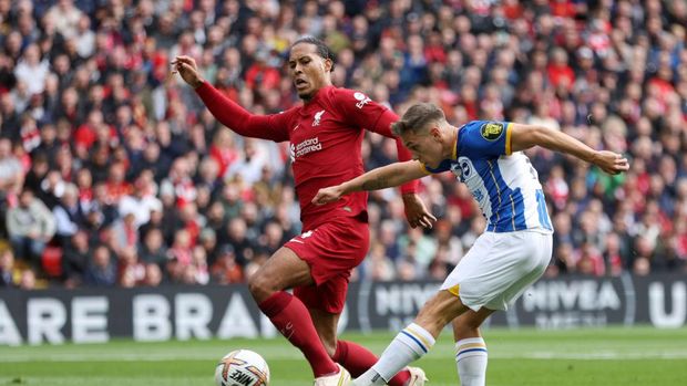 LIVERPOOL, ENGLAND - OCTOBER 01: Leandro Trossard of Brighton & Hove Albion scores their sides second goal during the Premier League match between Liverpool FC and Brighton & Hove Albion at Anfield on October 01, 2022 in Liverpool, England. (Photo by Clive Brunskill/Getty Images)
