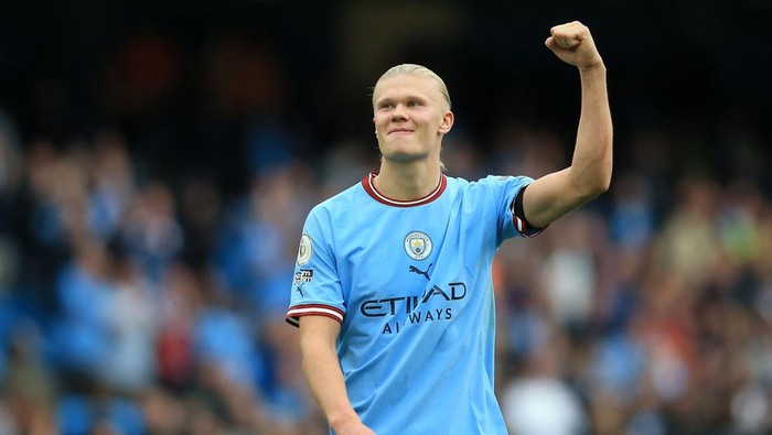 Manchester Citys Norwegian striker Erling Haaland gesture after the English Premier League football match between Manchester City and Manchester United at the Etihad Stadium in Manchester, north west England, on October 2, 2022. - RESTRICTED TO EDITORIAL USE. No use with unauthorized audio, video, data, fixture lists, club/league logos or live services. Online in-match use limited to 120 images. An additional 40 images may be used in extra time. No video emulation. Social media in-match use limited to 120 images. An additional 40 images may be used in extra time. No use in betting publications, games or single club/league/player publications. (Photo by Lindsey Parnaby / AFP) / RESTRICTED TO EDITORIAL USE. No use with unauthorized audio, video, data, fixture lists, club/league logos or live services. Online in-match use limited to 120 images. An additional 40 images may be used in extra time. No video emulation. Social media in-match use limited to 120 images. An additional 40 images may be used in extra time. No use in betting publications, games or single club/league/player publications. / RESTRICTED TO EDITORIAL USE. No use with unauthorized audio, video, data, fixture lists, club/league logos or live services. Online in-match use limited to 120 images. An additional 40 images may be used in extra time. No video emulation. Social media in-match use limited to 120 images. An additional 40 images may be used in extra time. No use in betting publications, games or single club/league/player publications. (Photo by LINDSEY PARNABY/AFP via Getty Images)