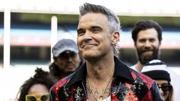 MELBOURNE, AUSTRALIA - SEPTEMBER 22: Robbie Williams  during a media opportunity announcing the AFL Grand Final entertainment line-up at Melbourne Cricket Ground on September 22, 2022 in Melbourne, Australia. (Photo by Sam Tabone/WireImage)