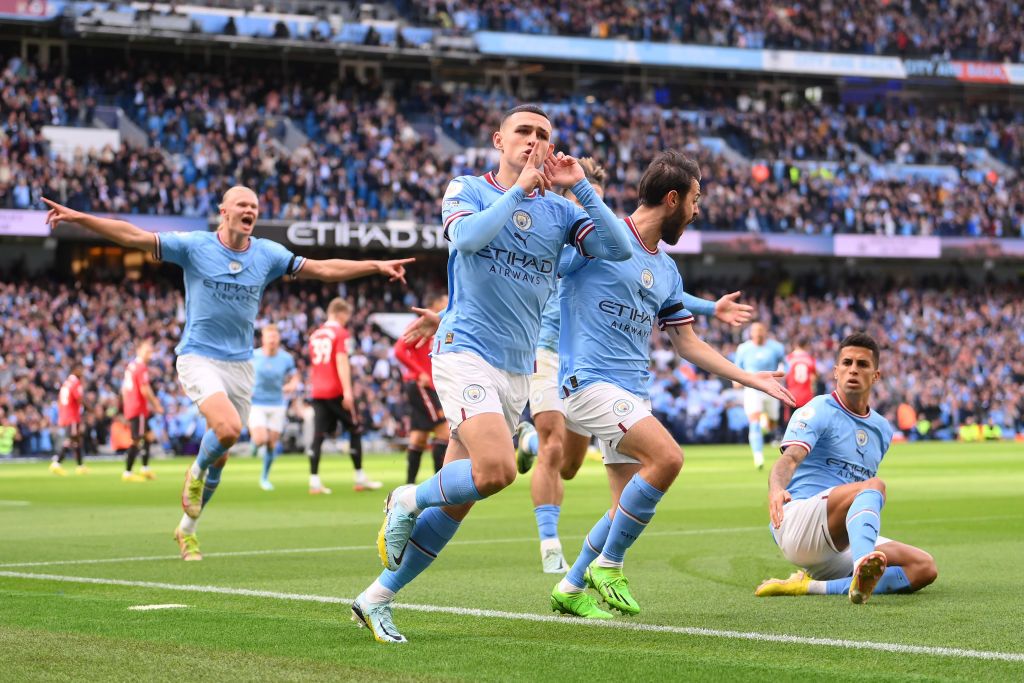 MANCHESTER, ENGLAND - OCTOBER 02: Phil Foden of Manchester City celebrates their sides first goal during the Premier League match between Manchester City and Manchester United at Etihad Stadium on October 02, 2022 in Manchester, England. (Photo by Laurence Griffiths/Getty Images)