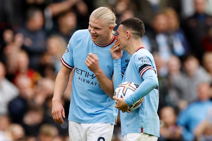 MANCHESTER, ENGLAND - OCTOBER 02: Erling Haaland and Phil Foden of Manchester City interact following the Premier League match between Manchester City and Manchester United at Etihad Stadium on October 02, 2022 in Manchester, England. (Photo by Lynne Cameron - Manchester City/Manchester City FC via Getty Images)