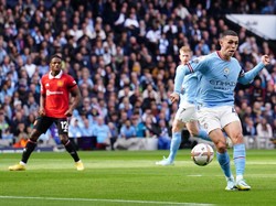 Foden-lah yang membuka kemenangan Man City atas MU lewat golnya di menit ke-8. Foto: PA Images via Getty Images/Martin Rickett - PA Images