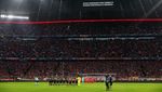 Potret Viral Sindiran Fans Bayern Munich ke Polisi soal Tragedi Kanjuruhan