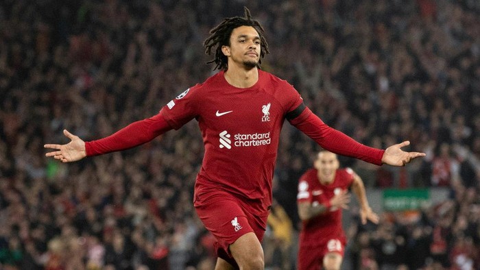 LIVERPOOL, ENGLAND - OCTOBER 04: Liverpools Trent Alexander-Arnold celebrates scoring a free kick to make it 1-0 during a UEFA Champions League match between Liverpool and Rangers at Anfield, on October 04, 2022, in Liverpool, England. (Photo by Craig Williamson/SNS Group via Getty Images)