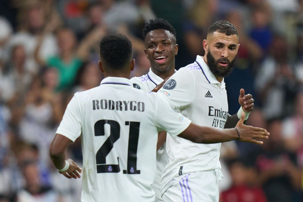 MADRID, SPAIN - OCTOBER 05: Vinicius Junior of Real Madrid celebrates Karim Benzema and Rodrygo Goes after scoring their side's second goal during the UEFA Champions League group F match between Real Madrid and Shakhtar Donetsk at Estadio Santiago Bernabeu on October 05, 2022 in Madrid, Spain. (Photo by Angel Martinez/Getty Images)