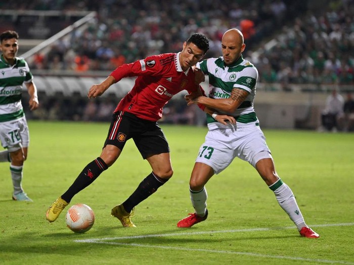 NICOSIA, CYPRUS - OCTOBER 06: Cristiano Ronaldo of Manchester United is challenged by Nemanja Miletic of Omonia Nicosia during the UEFA Europa League group E match between Omonia Nikosia and Manchester United at GSP Stadium on October 06, 2022 in Nicosia, Cyprus. (Photo by Manchester United/Manchester United via Getty Images)