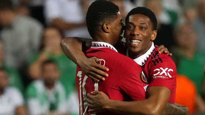 Manchester Uniteds Anthony Martial, right, celebrates after scoring his sides second goal with his teammate Marcus Rashford during the Europa League group E soccer match between Omonia and Manchester United at GSP stadium in Nicosia, Cyprus, Thursday, Oct. 6, 2022. (AP Photo/Petros Karadjias)