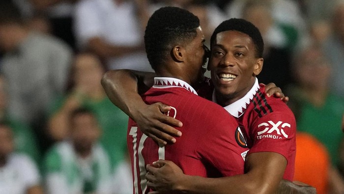 Manchester Uniteds Anthony Martial, right, celebrates after scoring his sides second goal with his teammate Marcus Rashford during the Europa League group E soccer match between Omonia and Manchester United at GSP stadium in Nicosia, Cyprus, Thursday, Oct. 6, 2022. (AP Photo/Petros Karadjias)