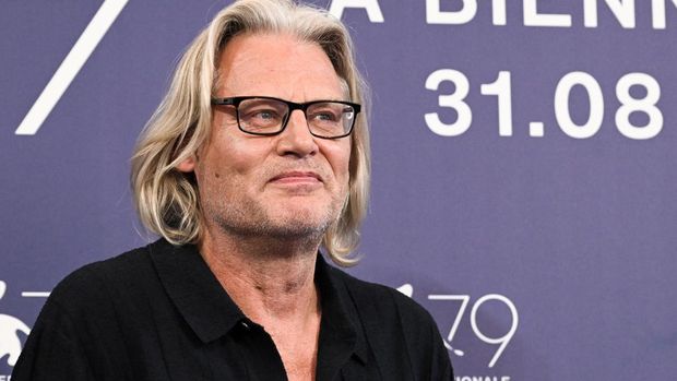 (FILES) In this file photo taken on September 8, 2022 Australian New Zealand director Andrew Dominik poses on September during a photocall for the film 