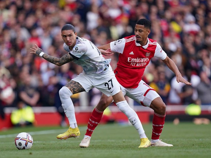 Liverpool's Darwin Nunez (left) and Arsenal's William Saliba battle for the ball during the Premier League match at the Emirates Stadium, London. Picture date: Sunday October 9, 2022. (Photo by Adam Davy/PA Images via Getty Images)