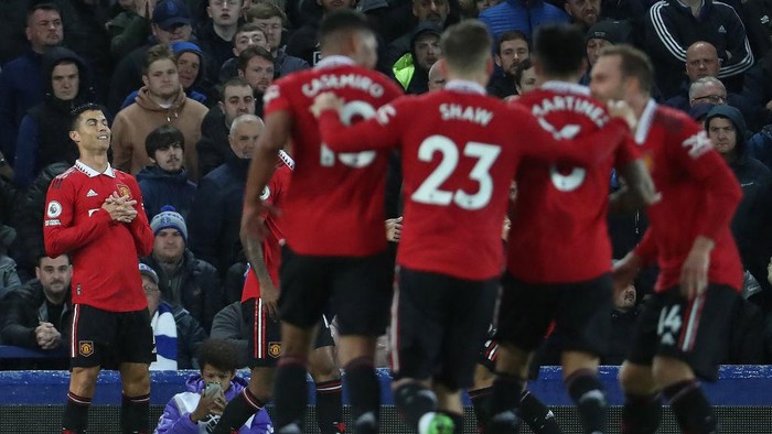 LIVERPOOL, ENGLAND - OCTOBER 09: Cristiano Ronaldo of Manchester United celebrates scoring their second goal during the Premier League match between Everton FC and Manchester United at Goodison Park on October 09, 2022 in Liverpool, England. (Photo by Tom Purslow/Manchester United via Getty Images)