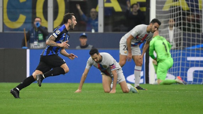 Hakan Calhanoglu of Fc Internazionale celebrates after scoring the goal of 1-0 during the Champions League Group C football match between FC Internazionale and FCB Barcelona at San Siro stadium in Milano (Italy), October 4th, 2022. (Photo by Elianto/Mondadori Portfolio via Getty Images)
