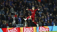 Pesta gol Liverpool ditutup dengan gol Harvey Elliott di menit ke-87 usai menembak bola liar hasil sepakan Jota yang ditepis McGregor. 
