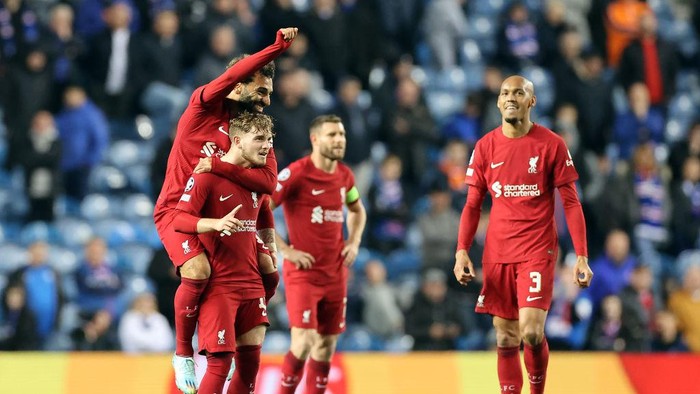 Liverpools Harvey Elliott celebrates scoring their sides seventh goal of the game with team-mate Mohamed Salah after a VAR check during the UEFA Champions League Group A match at the Ibrox Stadium, Glasgow. Picture date: Wednesday October 12, 2022. (Photo by Steve Welsh/PA Images via Getty Images)