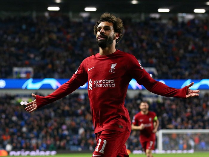 GLASGOW, SCOTLAND - OCTOBER 12:  Mohamed Salah of Liverpool FC celebrates after scoring their sixth goal and his hat-trick during the UEFA Champions League group A match between Rangers FC and Liverpool FC at Ibrox Stadium on October 12, 2022 in Glasgow, Scotland. (Photo by Alex Livesey - Danehouse/Getty Images)