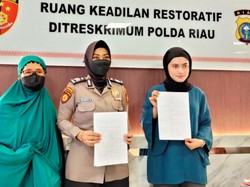 Wanita yang Dipukul-Sekap Polwan di Pekanbaru Cabut Laporan