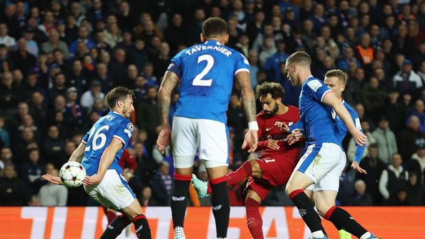GLASGOW, SCOTLAND - OCTOBER 12: Mohamed Salah of Liverpool scores their team's fifth goal during the UEFA Champions League group A match between Rangers FC and Liverpool FC at Ibrox Stadium on October 12, 2022 in Glasgow, Scotland. (Photo by Ian MacNicol/Getty Images)