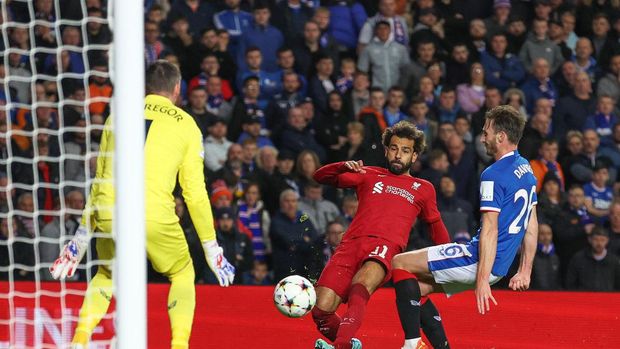 GLASGOW, SCOTLAND - OCTOBER 12: Mohamed Salah of Liverpool scores their team's fourth goal during the UEFA Champions League group A match between Rangers FC and Liverpool FC at Ibrox Stadium on October 12, 2022 in Glasgow, Scotland. (Photo by Ian MacNicol/Getty Images)
