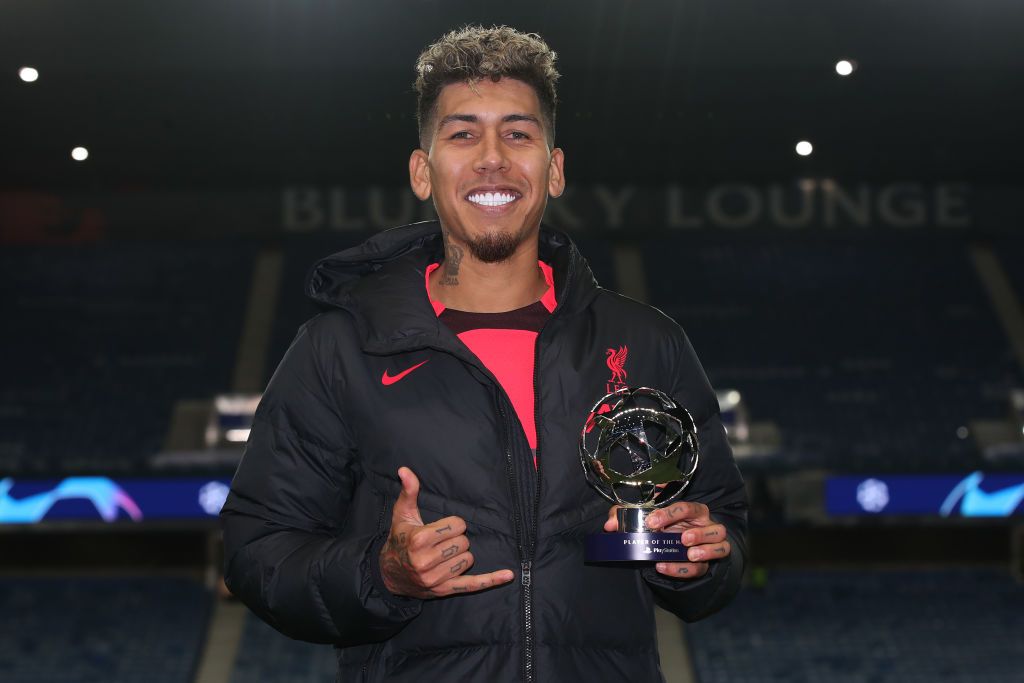 GLASGOW, SCOTLAND - OCTOBER 12: Roberto Firmino of Liverpool celebrates after scoring a goal to make it 1-2 during the UEFA Champions League group A match between Rangers FC and Liverpool FC at Ibrox Stadium on October 12, 2022 in Glasgow, United Kingdom. (Photo by Matthew Ashton - AMA/Getty Images)