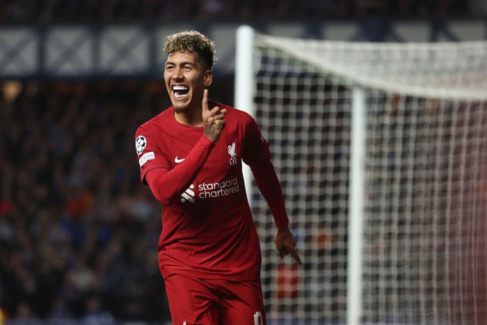GLASGOW, SCOTLAND - OCTOBER 12: Roberto Firmino of Liverpool celebrates after scoring a goal to make it 1-2 during the UEFA Champions League group A match between Rangers FC and Liverpool FC at Ibrox Stadium on October 12, 2022 in Glasgow, United Kingdom. (Photo by Matthew Ashton - AMA/Getty Images)