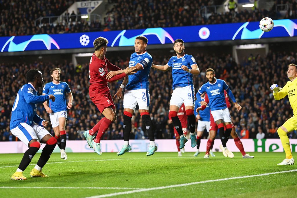 GLASGOW, SCOTLAND - OCTOBER 12: Roberto Firmino of Liverpool celebrates after scoring a goal to make it 1-2 during the UEFA Champions League group A match between Rangers FC and Liverpool FC at Ibrox Stadium on October 12, 2022 in Glasgow, United Kingdom. (Photo by Matthew Ashton - AMA/Getty Images)