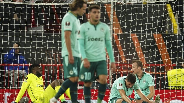 Francis Uzoho Vs MU Omonia's goalkeeper Francis Uzoho , left, reacts after his team receive the opening goal during a group E Europa League soccer match between Manchester United and Omonia at Old Trafford stadium in Manchester, England, Thursday, Oct. 13, 2022. (AP Photo/Dave Thompson)