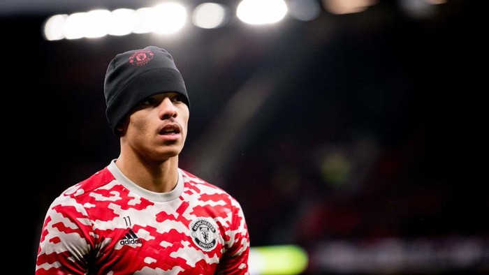 MANCHESTER, ENGLAND - JANUARY 22:    Mason Greenwood of Manchester United warms up prior to the Premier League match between Manchester United and West Ham United at Old Trafford on January 22, 2022 in Manchester, United Kingdom. (Photo by Ash Donelon/Manchester United via Getty Images)