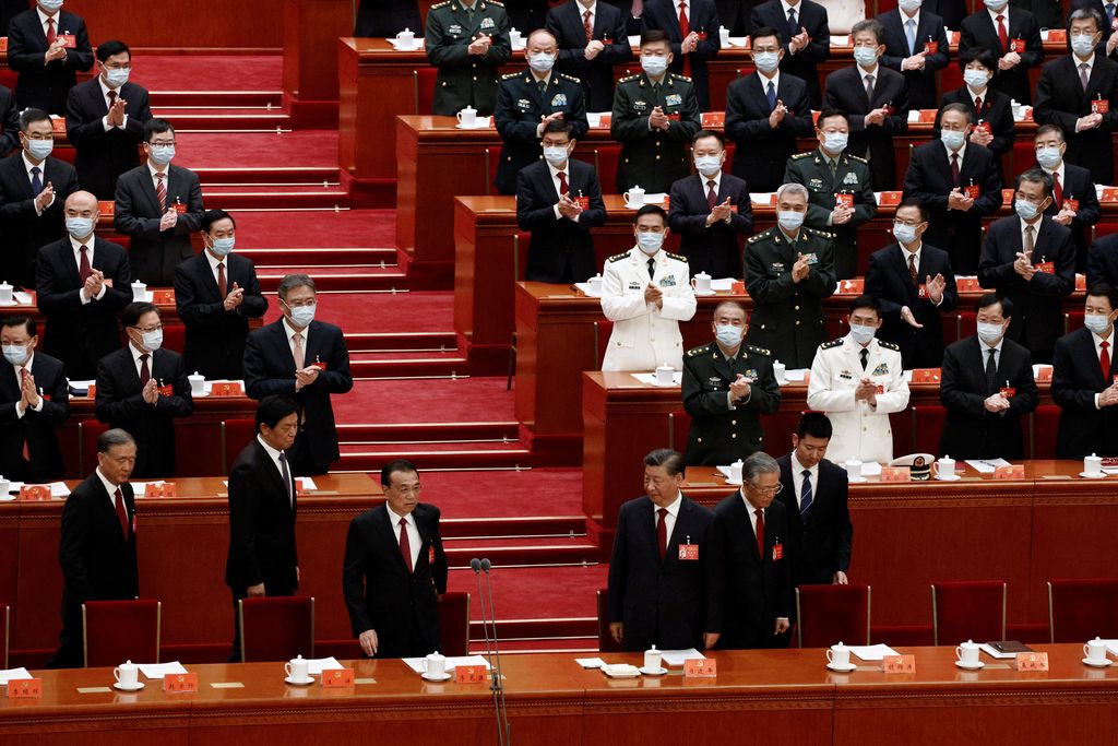 Chinese President Xi Jinping, former president Hu Jintao, Premier Li Keqiang, Chinese People's Political Consultative Conference (CPPCC) Chairman Wang Yang, and National People's Congress (NPC) Standing Committee Chairman Li Zhanshu arrive for the opening ceremony of the 20th National Congress of the Communist Party of China, at the Great Hall of the People in Beijing, China October 16, 2022. REUTERS/Thomas Peter
