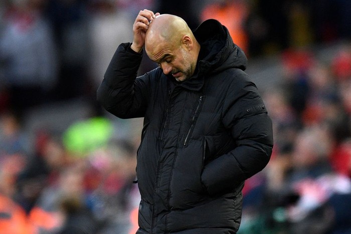 Manchester Citys Spanish manager Pep Guardiola gestures on the touchline during the English Premier League football match between Liverpool and Manchester City at Anfield in Liverpool, north west England on October 16, 2022. - - RESTRICTED TO EDITORIAL USE. No use with unauthorized audio, video, data, fixture lists, club/league logos or live services. Online in-match use limited to 120 images. An additional 40 images may be used in extra time. No video emulation. Social media in-match use limited to 120 images. An additional 40 images may be used in extra time. No use in betting publications, games or single club/league/player publications. (Photo by Oli SCARFF / AFP) / RESTRICTED TO EDITORIAL USE. No use with unauthorized audio, video, data, fixture lists, club/league logos or live services. Online in-match use limited to 120 images. An additional 40 images may be used in extra time. No video emulation. Social media in-match use limited to 120 images. An additional 40 images may be used in extra time. No use in betting publications, games or single club/league/player publications. / RESTRICTED TO EDITORIAL USE. No use with unauthorized audio, video, data, fixture lists, club/league logos or live services. Online in-match use limited to 120 images. An additional 40 images may be used in extra time. No video emulation. Social media in-match use limited to 120 images. An additional 40 images may be used in extra time. No use in betting publications, games or single club/league/player publications. (Photo by OLI SCARFF/AFP via Getty Images)