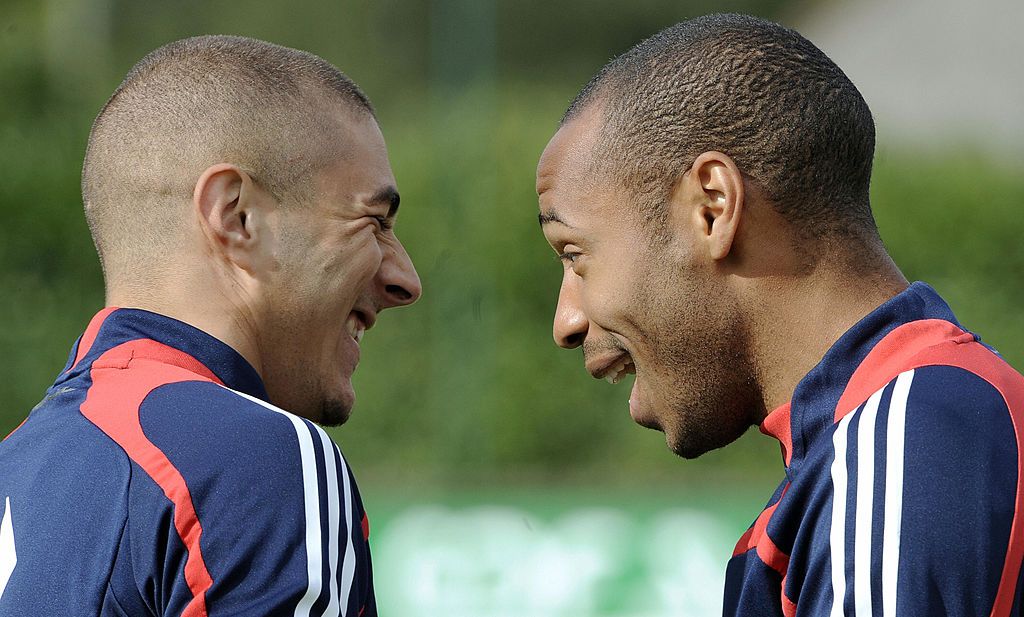 France's forward Thierry Henry (R) jokes with forward Karim Benzema during a training session in Clairefontaine, south of Paris, on September 3, 2008, three days ahead of the World Cup 2010 qualifying football match against Austria in Vienna.  AFP PHOTO FRANCK FIFE (Photo credit should read FRANCK FIFE/AFP via Getty Images)
