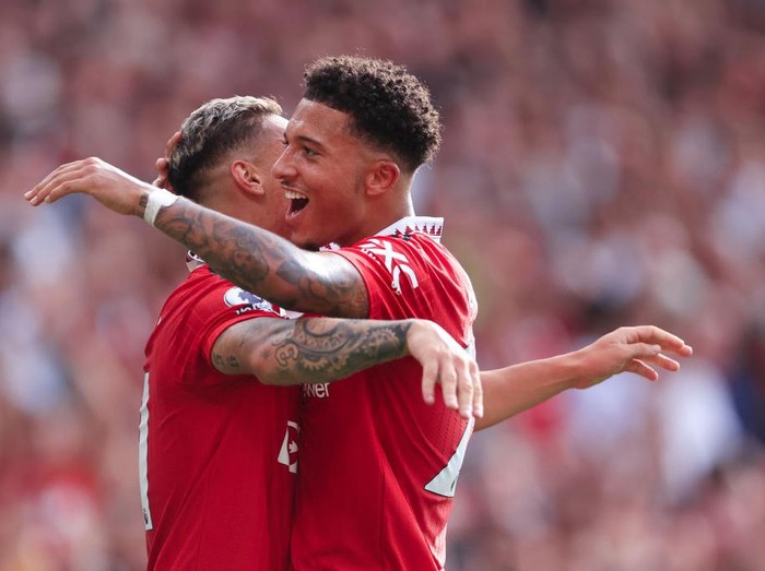 MANCHESTER, ENGLAND - SEPTEMBER 04: Antony of Manchester United (L) celebrates with Jadon Sancho of Manchester United after scoring their 1st goal during the Premier League match between Manchester United and Arsenal FC at Old Trafford on September 4, 2022 in Manchester, United Kingdom. (Photo by Simon Stacpoole/Offside/Offside via Getty Images)