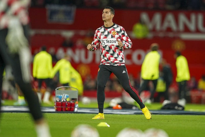 Manchester Uniteds Cristiano Ronaldo warms up ahead of the English Premier League soccer match between Manchester United and Tottenham Hotspur at Old Trafford in Manchester, England, Wednesday, Oct. 19, 2022. (AP Photo/Dave Thompson)