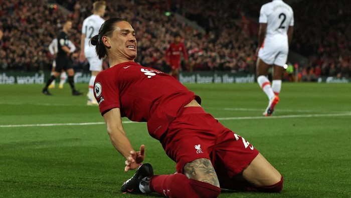 Liverpools Uruguayan striker Darwin Nunez celebrates after scoring the opening goal of the English Premier League football match between Liverpool and West Ham United at Anfield in Liverpool, north-west England on October 19, 2022. - - RESTRICTED TO EDITORIAL USE. No use with unauthorized audio, video, data, fixture lists, club/league logos or live services. Online in-match use limited to 120 images. An additional 40 images may be used in extra time. No video emulation. Social media in-match use limited to 120 images. An additional 40 images may be used in extra time. No use in betting publications, games or single club/league/player publications. (Photo by Nigel Roddis / AFP) / RESTRICTED TO EDITORIAL USE. No use with unauthorized audio, video, data, fixture lists, club/league logos or live services. Online in-match use limited to 120 images. An additional 40 images may be used in extra time. No video emulation. Social media in-match use limited to 120 images. An additional 40 images may be used in extra time. No use in betting publications, games or single club/league/player publications. / RESTRICTED TO EDITORIAL USE. No use with unauthorized audio, video, data, fixture lists, club/league logos or live services. Online in-match use limited to 120 images. An additional 40 images may be used in extra time. No video emulation. Social media in-match use limited to 120 images. An additional 40 images may be used in extra time. No use in betting publications, games or single club/league/player publications. (Photo by NIGEL RODDIS/AFP via Getty Images)