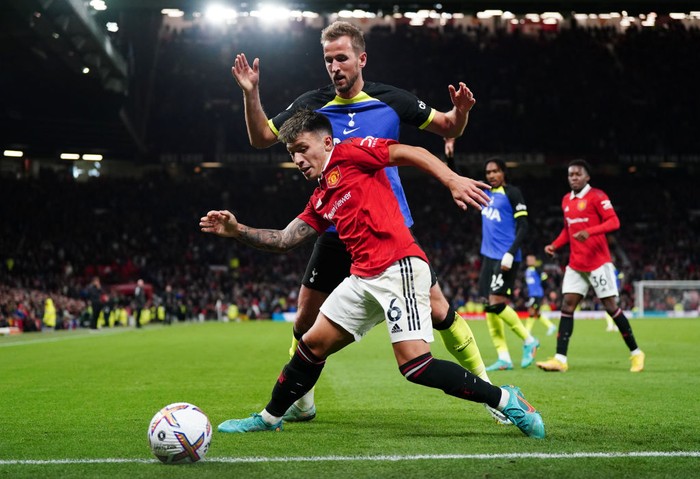 Lisandro Martinez, Harry Kane Tottenham Hotspur's Harry Kane and Manchester United's Lisandro Martinez (right) battle for the ball during the Premier League match at Old Trafford, Manchester. Picture date: Wednesday October 19, 2022. (Photo by Nick Potts/PA Images via Getty Images)