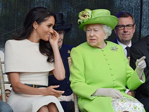 Britain's Queen Elizabeth II and Meghan, Duchess of Sussex open the Mersey Gateway Bridge, the new six lane toll bridge over the River Mersey in Halton, Cheshire on June 14, 2018. (Photo by Jim CLARKE / POOL / AFP)