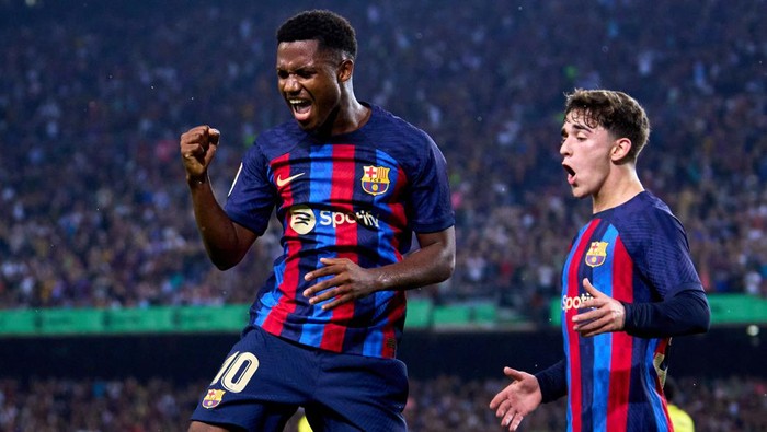 BARCELONA, SPAIN - OCTOBER 20: Ansu Fati of FC Barcelona celebrates with his teammate Pablo Paez Gavi after scoring their teams third goal during the LaLiga Santander match between FC Barcelona and Villarreal CF at Spotify Camp Nou on October 20, 2022 in Barcelona, Spain. (Photo by Alex Caparros/Getty Images)