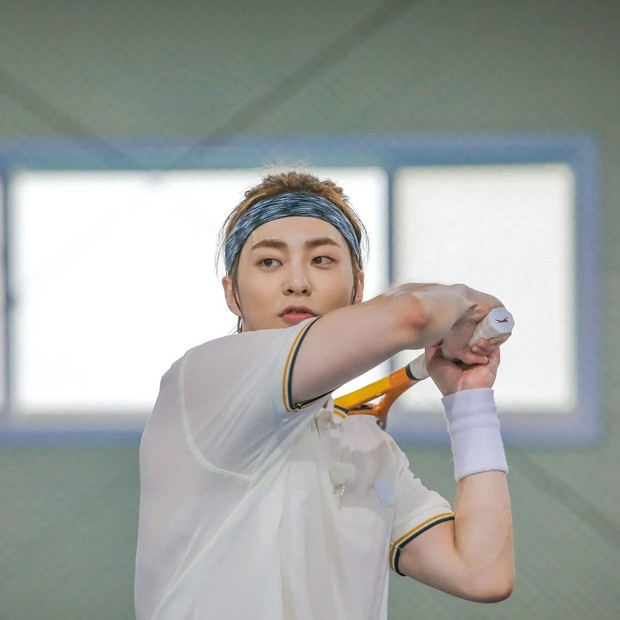 Xiumin ketika bermain tenis