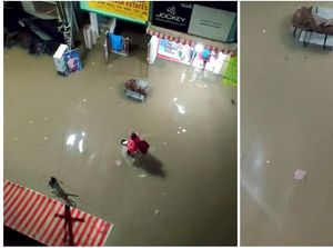 Salut! Ojol Ini Rela Menerjang Banjir Demi Antar Makanan Tepat Waktu