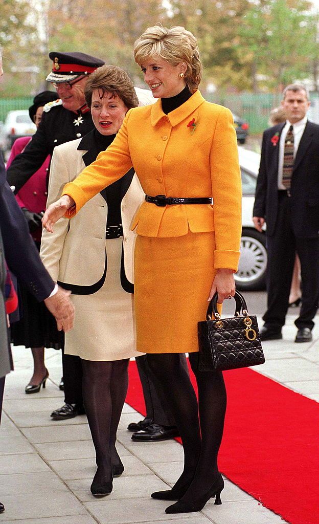LIVERPOOL, UNITED KINGDOM - NOVEMBER 07:  Princess Diana Arriving At The Liverpool Women's Hospital, Merseyside. Her Suit Is By Versace And Her Handbag By Dior.  (Photo by Tim Graham Photo Library via Getty Images)