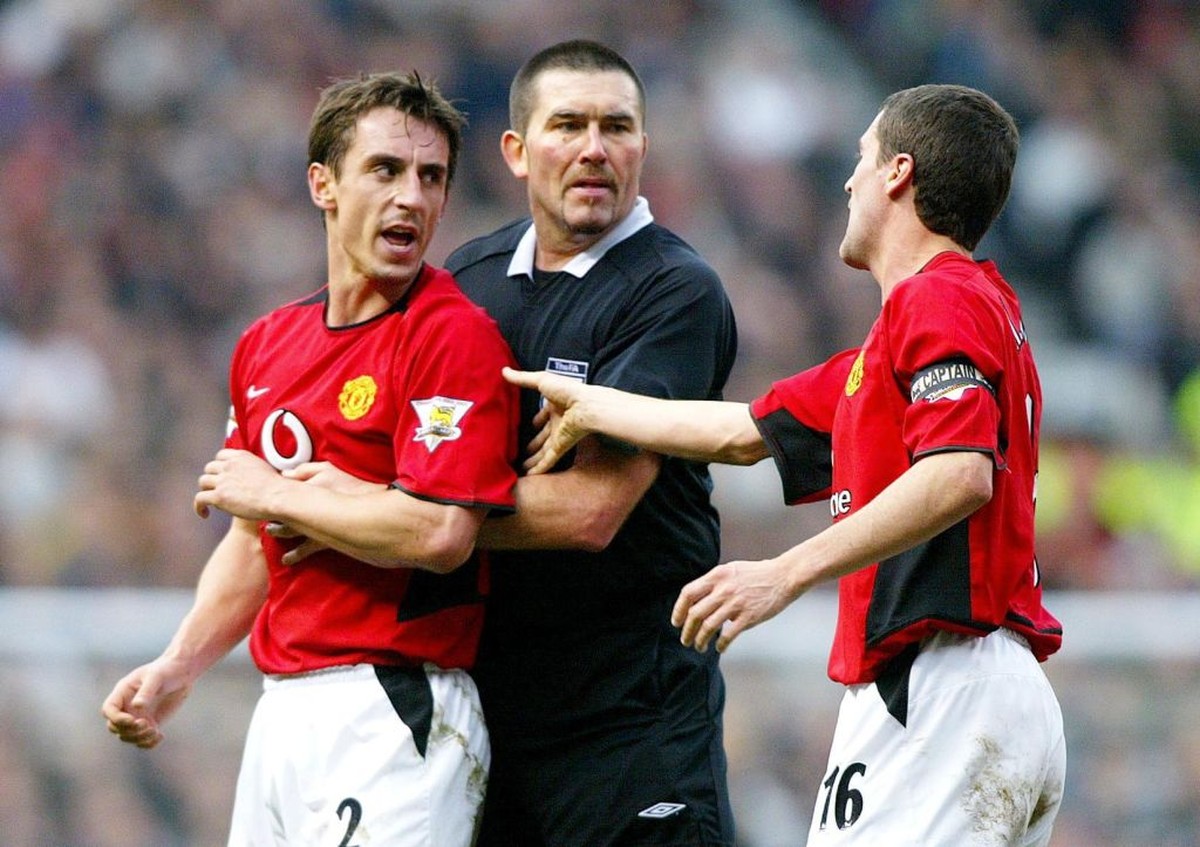 Gary Neville dan Roy Keane semasa sama-sama main di MU (Foto: PA Images via Getty Images/Martin Rickett - PA Images)