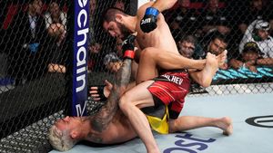 Momen Islam Makhachev Kalahkan Oliveira dan Raih Sabuk Juara