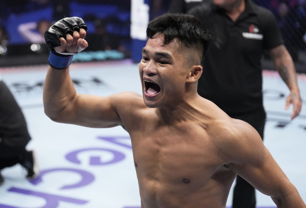 ABU DHABI, UNITED ARAB EMIRATES - OCTOBER 23: Jeka Saragih of Indonesia celebrates after his knockout victory over WonBin Ki of South Korea in a lightweight fight during the Road to UFC event at Etihad Arena on October 23, 2022 in Abu Dhabi, United Arab Emirates. (Photo by Chris Unger/Zuffa LLC)