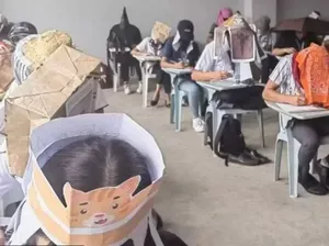 Aksi Unik Mahasiswa Filipina Pakai Topi Anti Nyontek Aksi Unik Mahasiswa Filipina Pakai Topi Anti Nyontek